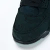 KAWS x Air Jordan 4 Retro Black Reps 4