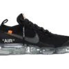 The Off-White x Air VaporMax 'Part 2' rep shoes showcase a sleek black upper with Off-White's iconic zip tie and textual overlays.